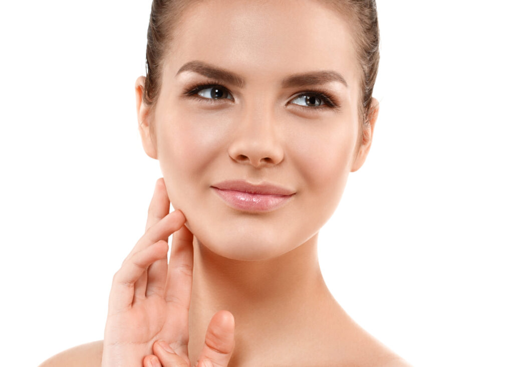Beauty blond woman face with perfect skin portrait. White background.