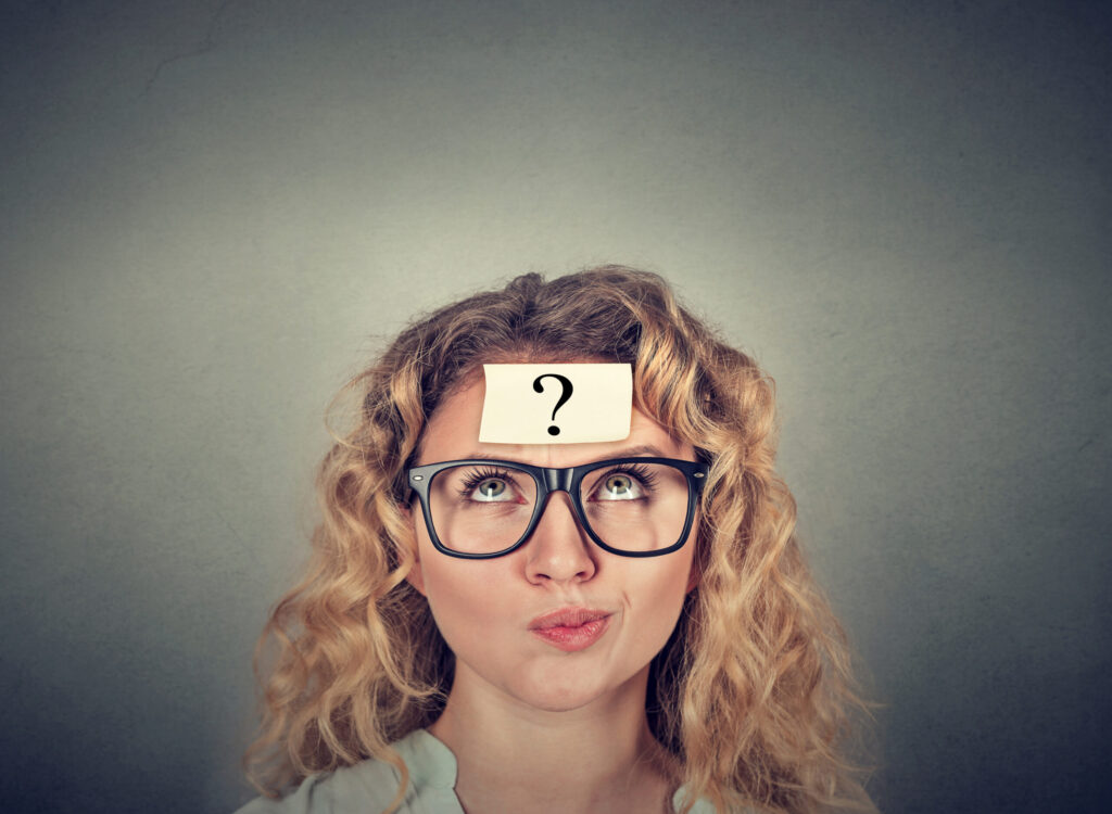thinking confused woman with question mark